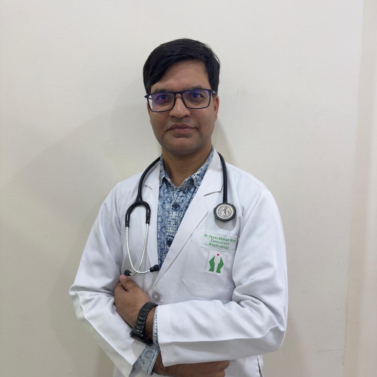 Home Doctor fayaz standing in doctor uniform